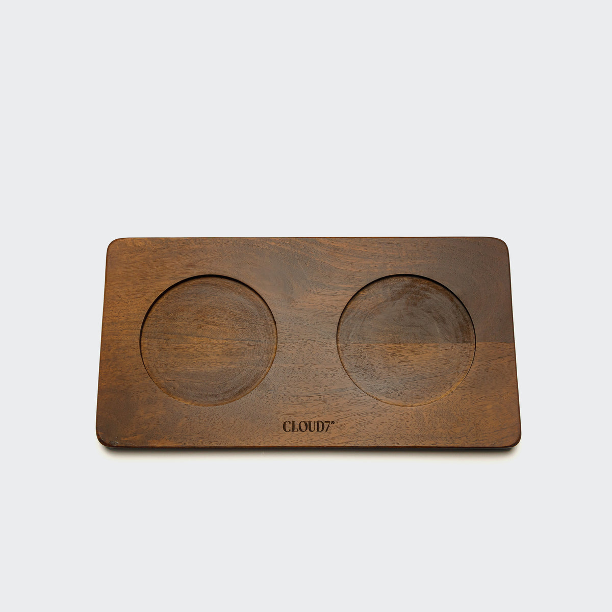 Cloud7 Mauro sustainable mango wood dog feeding station in a dark brown stained finish holding pet bowls small size