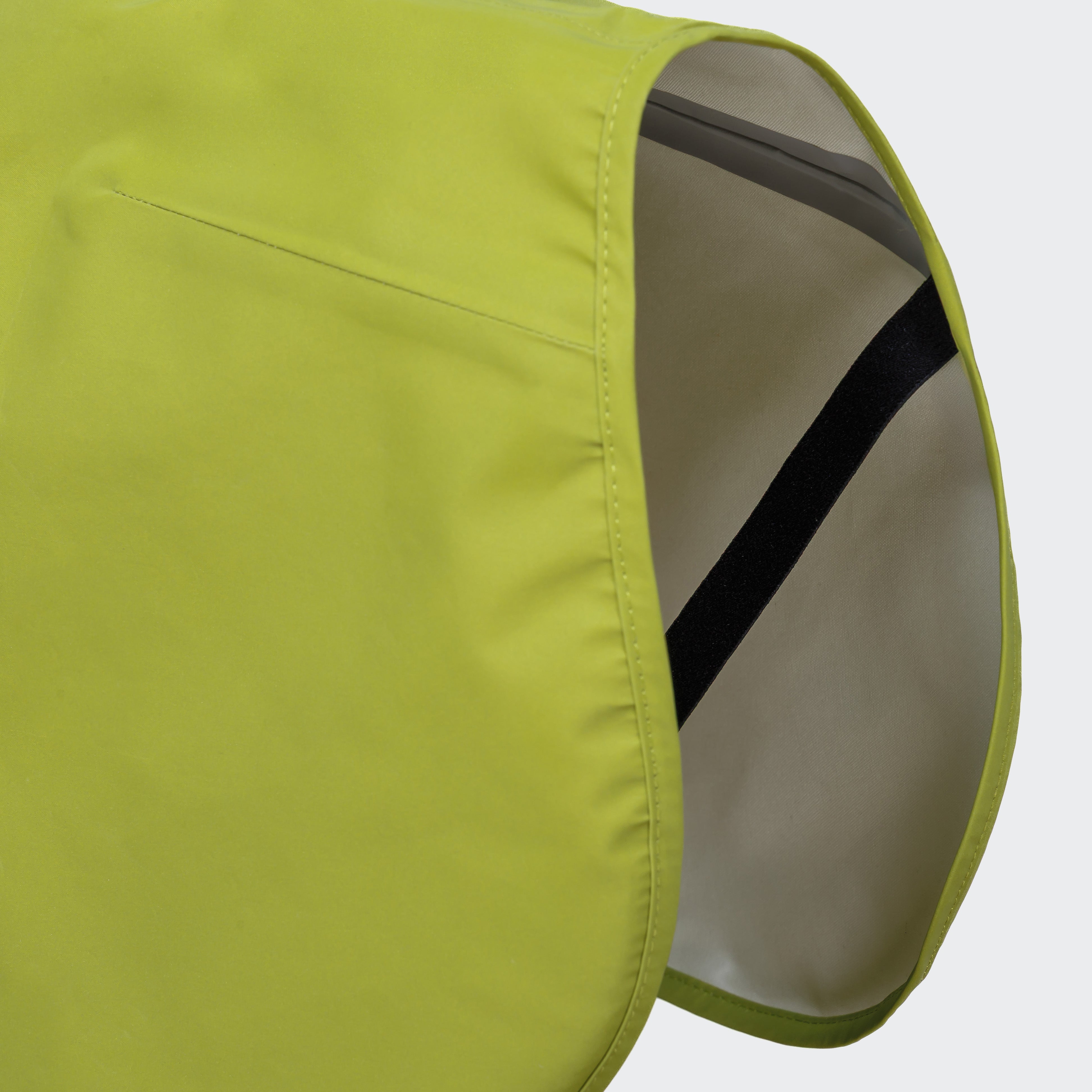 Cloud7 AKTIV reflective dog raincoat in high-visibility color, showcasing the extended shape and relaxed cut for full body coverage on a dog.