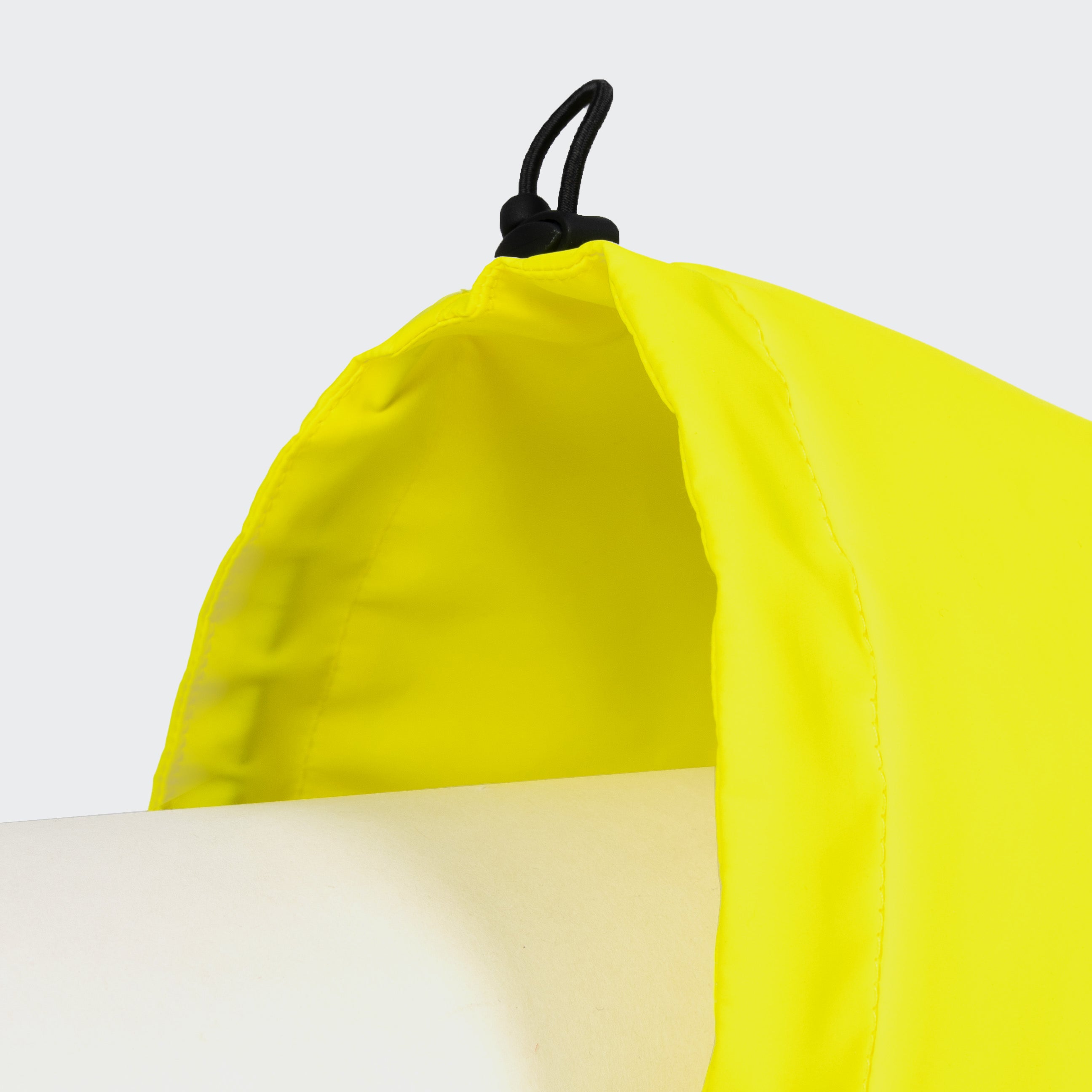 Cloud7 AKTIV reflective dog raincoat in high-visibility color, showcasing the extended shape and relaxed cut for full body coverage on a dog.