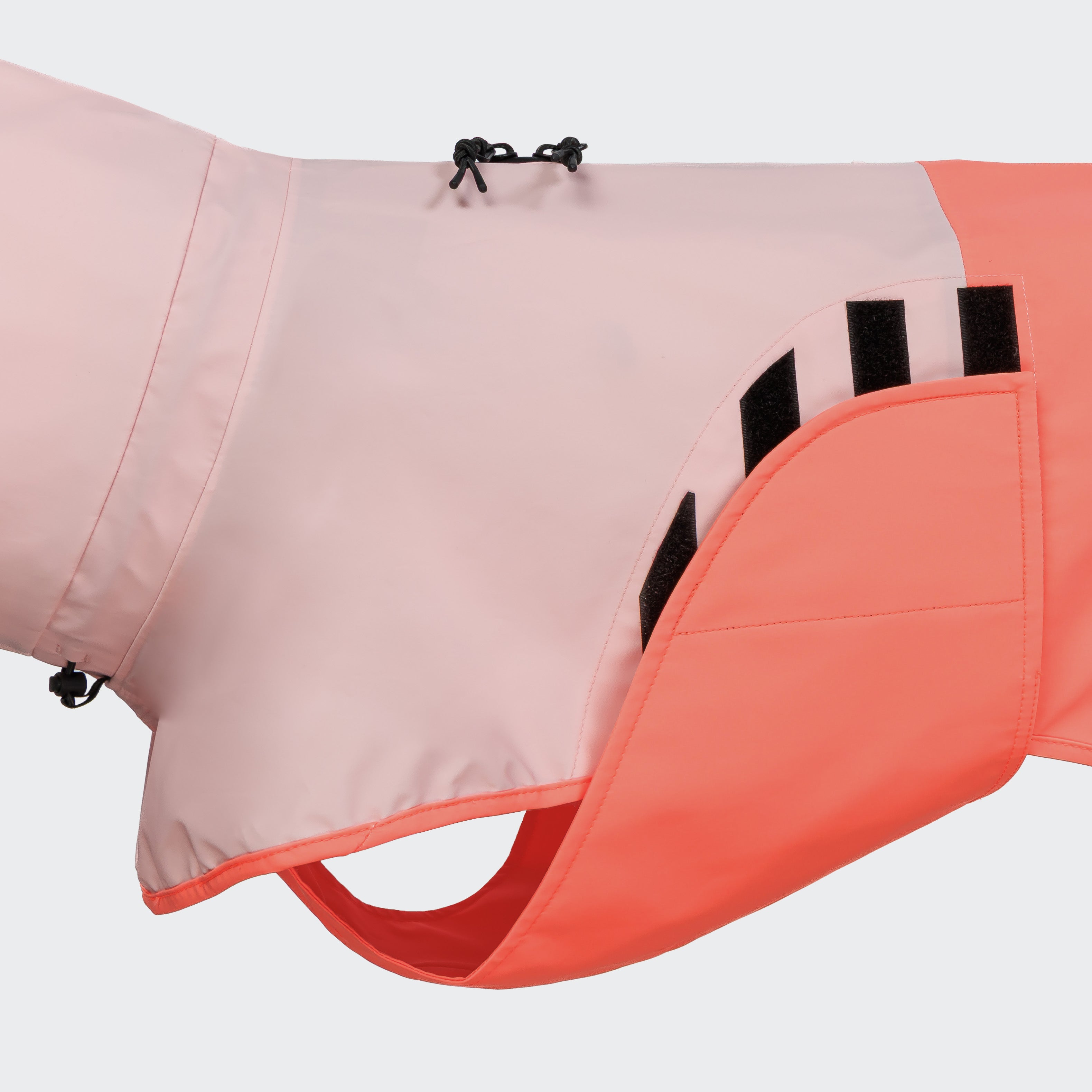 Cloud7 AKTIV reflective dog raincoat in high-visibility color, showcasing the extended shape and relaxed cut for full body coverage on a dog.