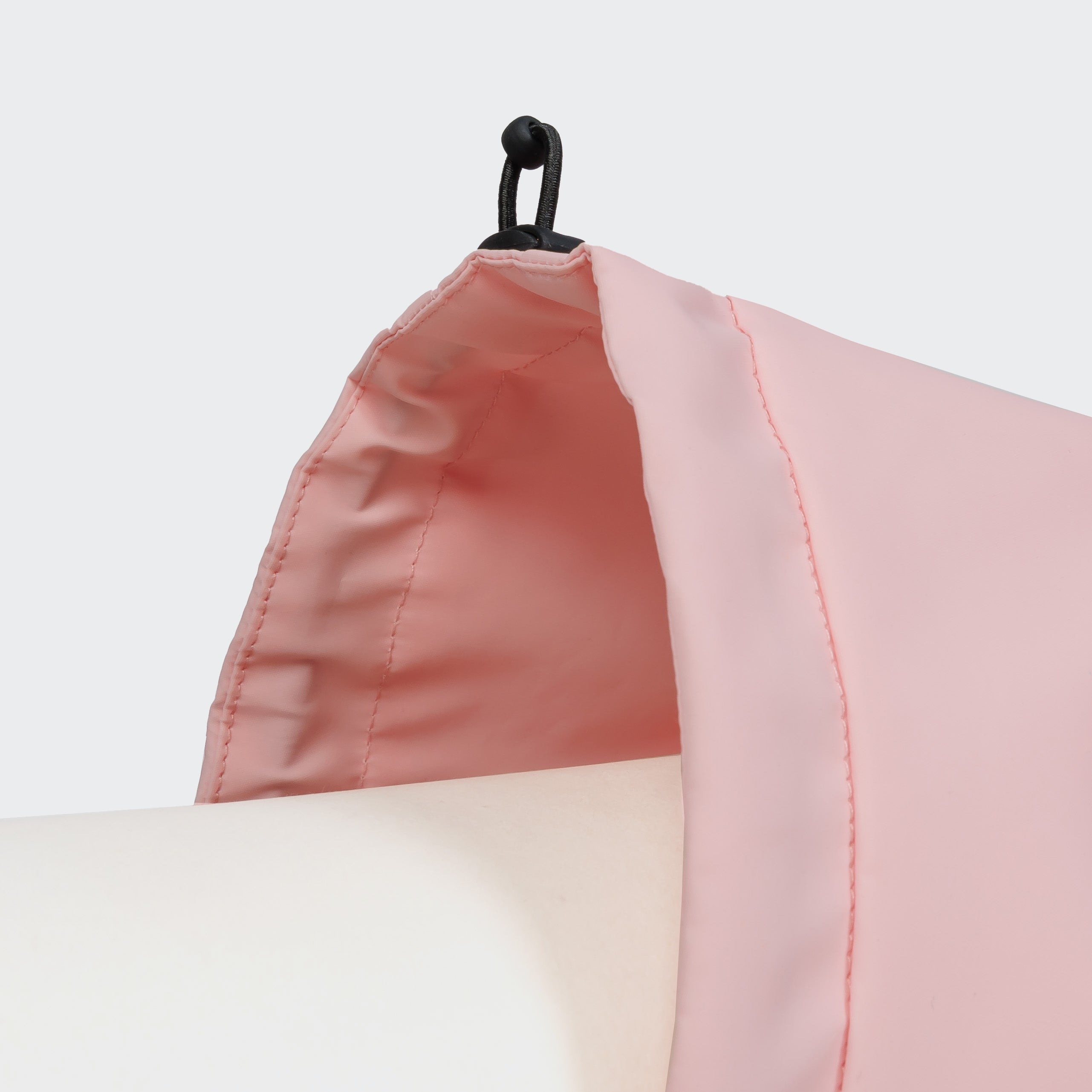 Cloud7 AKTIV reflective dog raincoat in high-visibility color, showcasing the extended shape and relaxed cut for full body coverage on a dog.