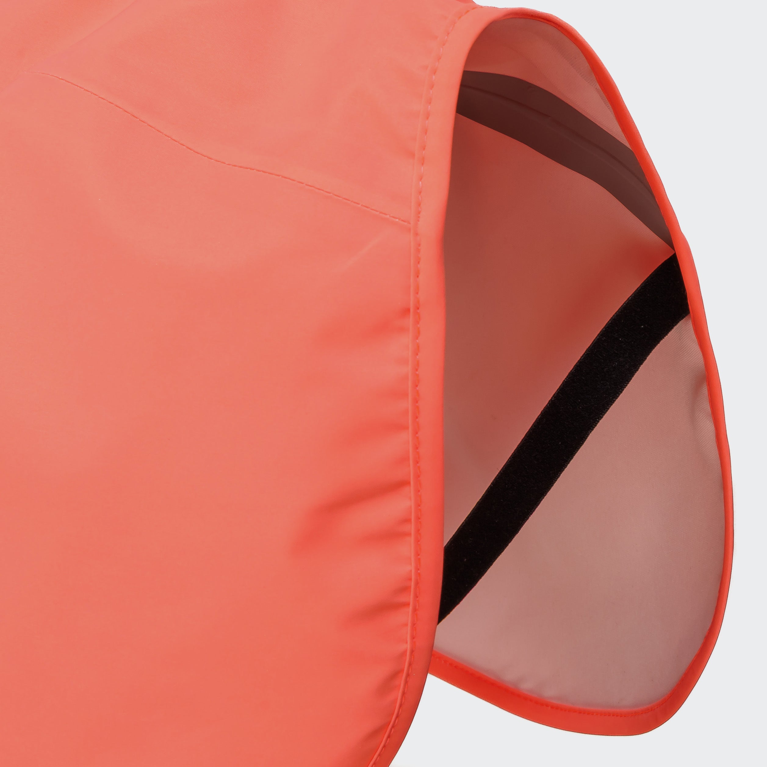 Cloud7 AKTIV reflective dog raincoat in high-visibility color, showcasing the extended shape and relaxed cut for full body coverage on a dog.