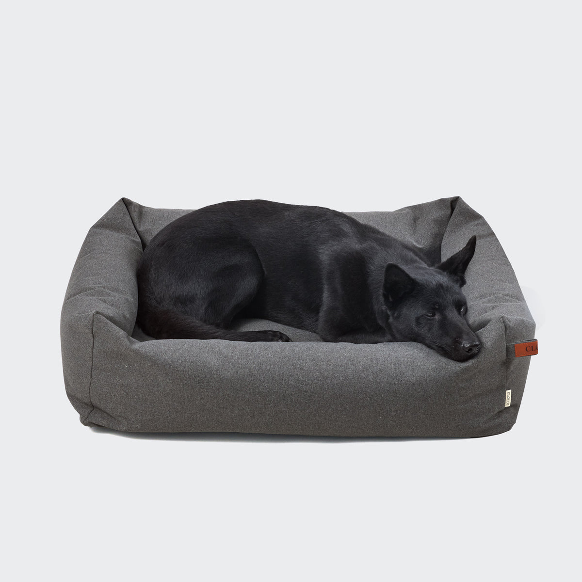 CLOUD7 Sleepy Deluxe indoor and outdoor dog bed with a waterproof cover and protective bolster rim in light graphite grey.