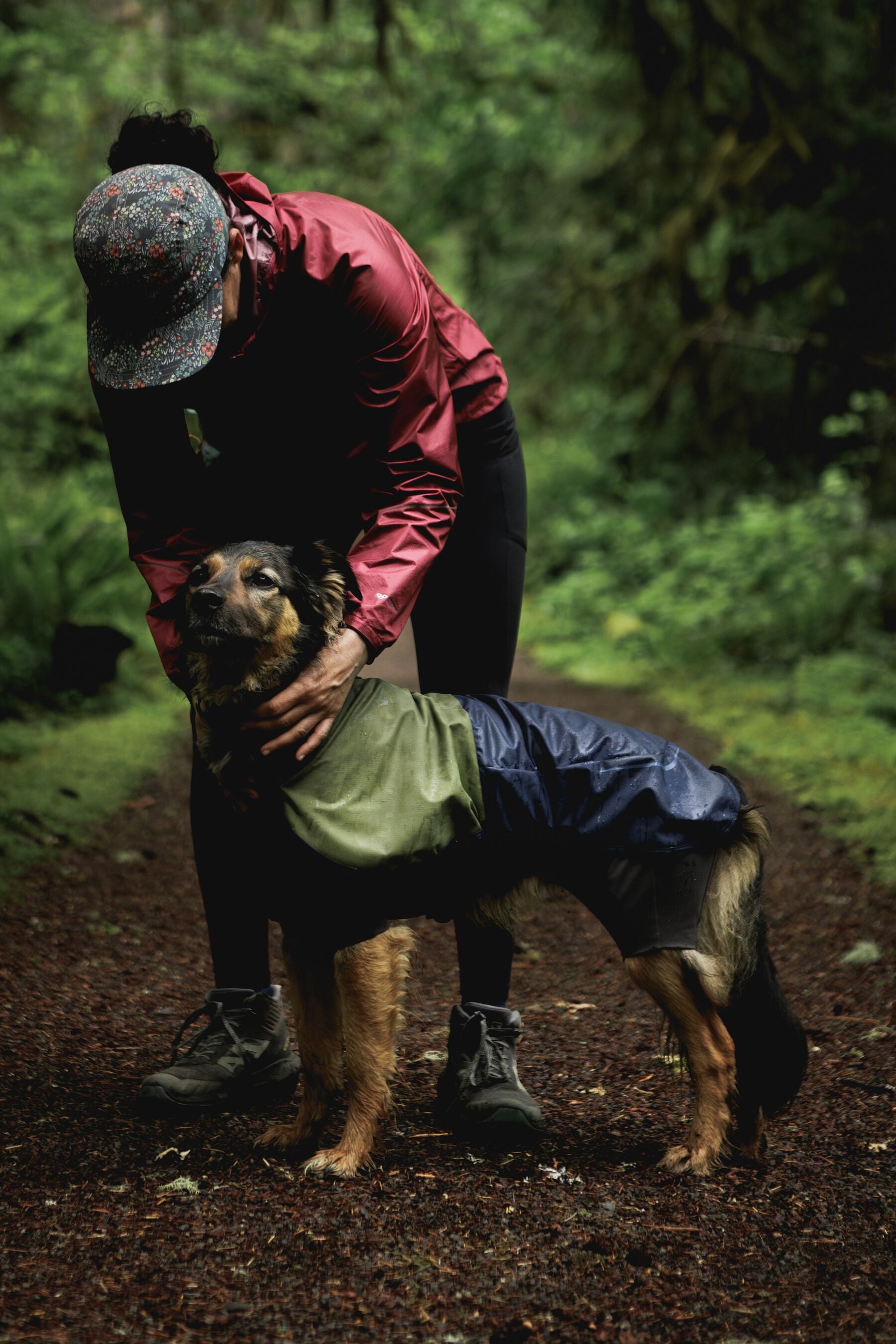 Waterproof Ruffwear Sun Shower dog raincoat with stretch sleeves and a chest zipper for full weatherproof protection